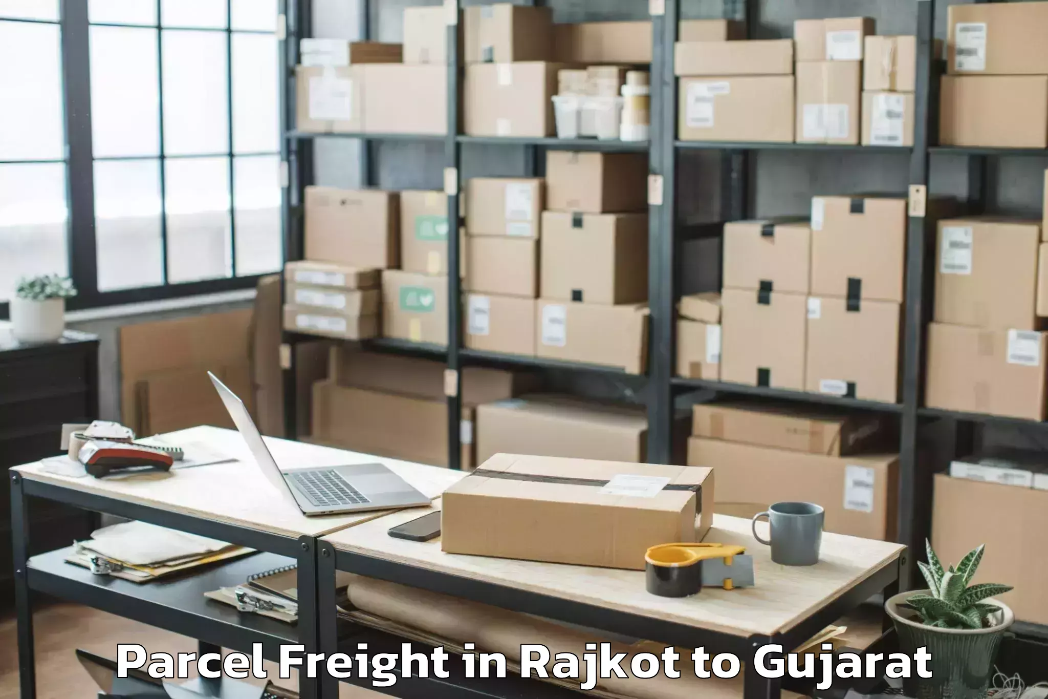 Trusted Rajkot to Gujarat University Of Transpla Parcel Freight